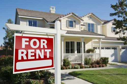 For rent sign in front of a house